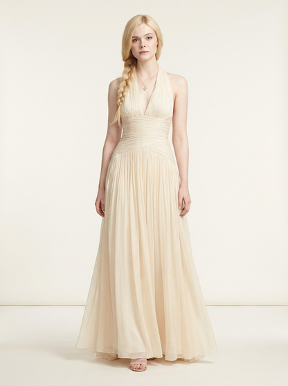 Halter Neck Pleated Maxi Dress with Spliced Folds and Cinched Waist in Apricot, front view (1 of 2)