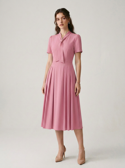 Pleated A-Line Midi Dress with Tie Neckline and Short Sleeves in Pink