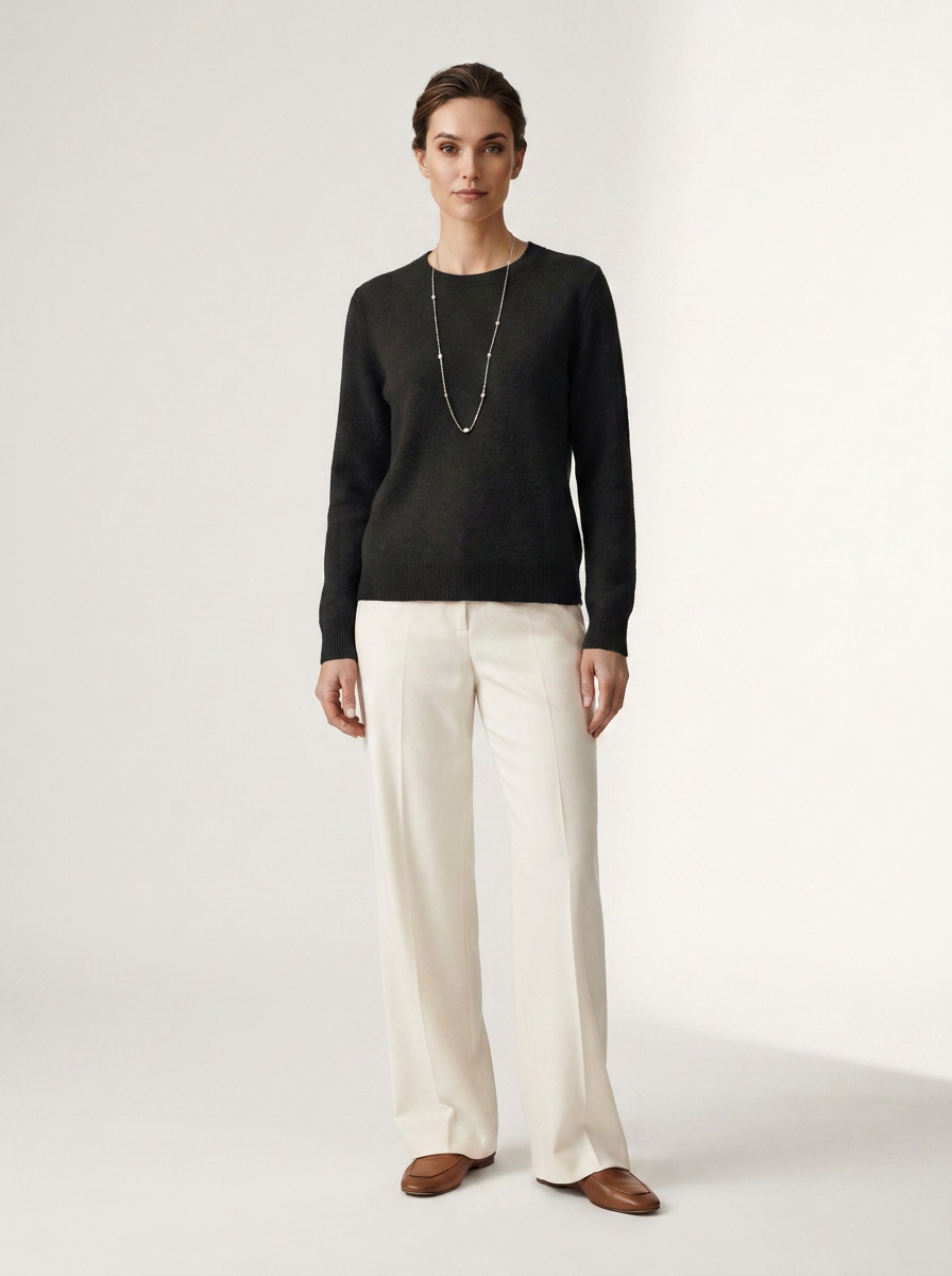 Crew Neck Merino Wool Pullover Minimalist Winter Knit Sweater in Black, studio shot