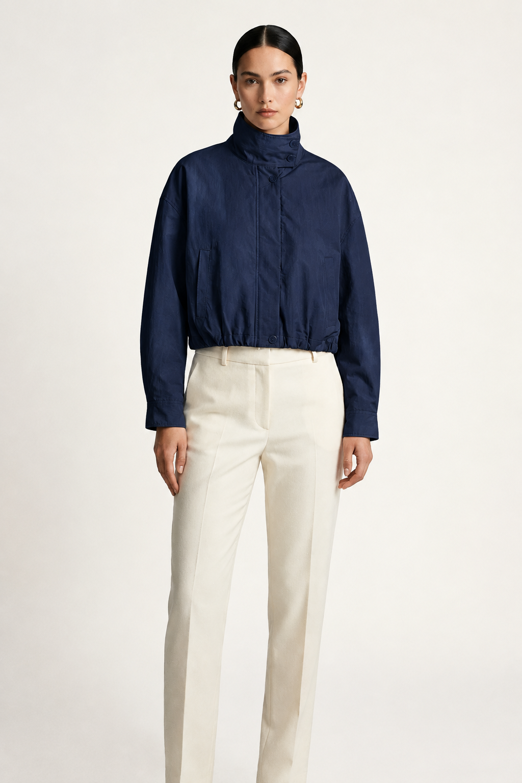 Cropped Slub Cotton Jacket with Tulip Silhouette and Striped Cuffs in Dark Blue, studio shot
