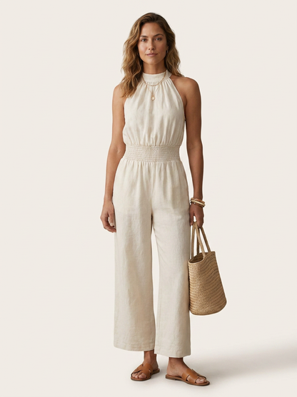 Halter Neck Wide-Leg Jumpsuit with Smocked High Waist in White, studio shot